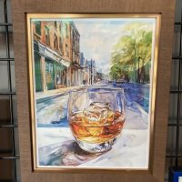 Bourbon watercolor in a custom frame Watercolor of a bourbon glass on a city street, framed with a linen mat and gold fillet