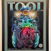 Framed concert poster Concert poster framed with a wide mat and black frame
