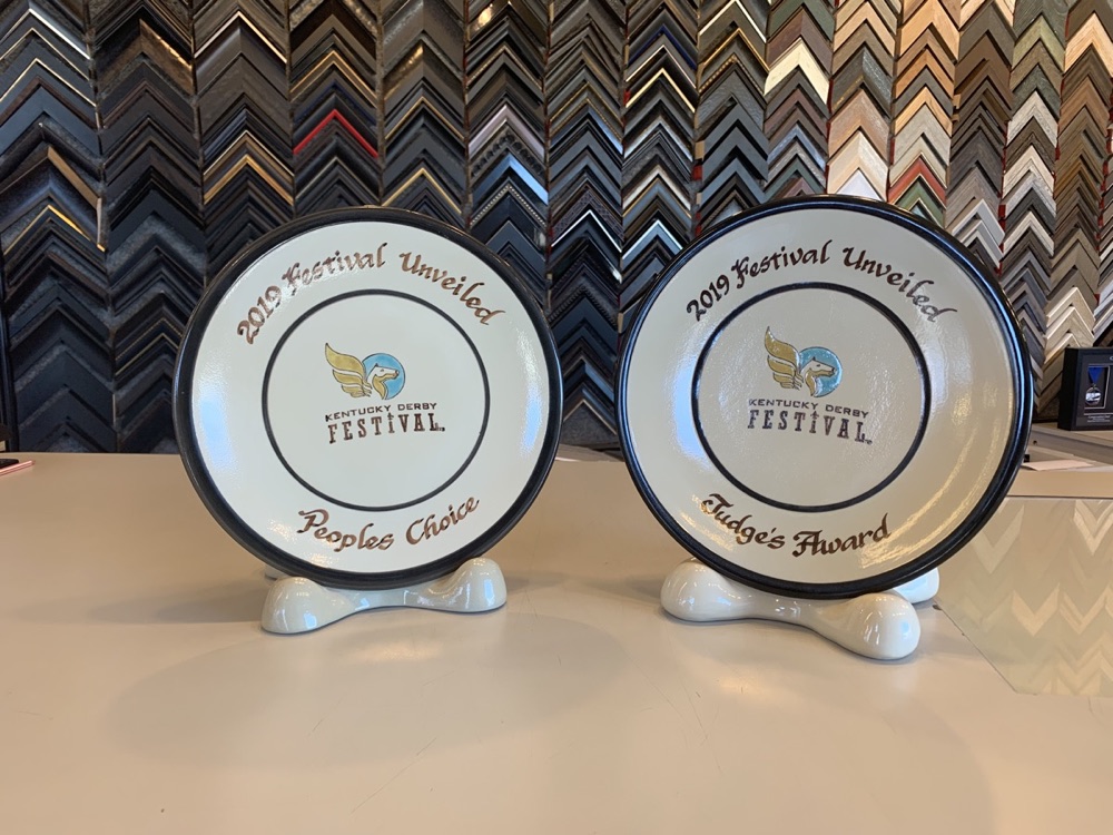 Kentucky Derby Festival award plates framed by Bluegrass Frames